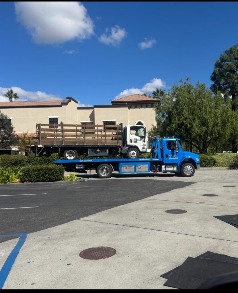 Team Smith Logistics transporting industrial equipment on a flatbed